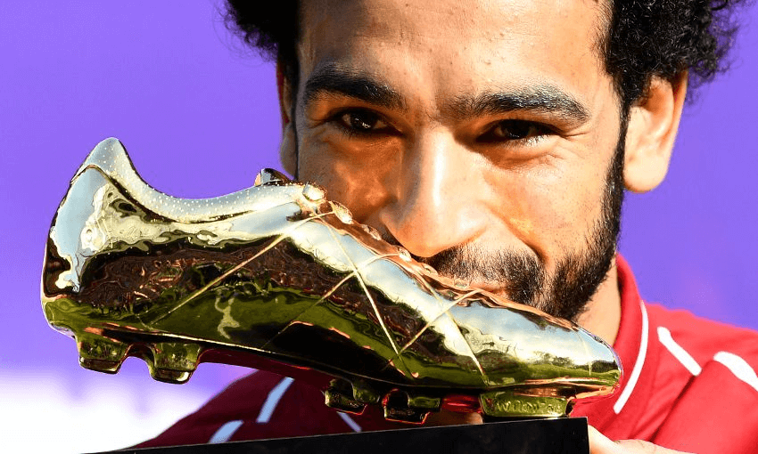 Mohamed Salah holding the golden boot